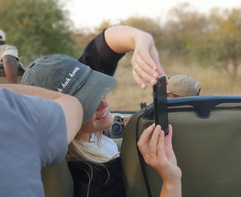 A family safari enjoy an open vehicle game drive Family on Safari