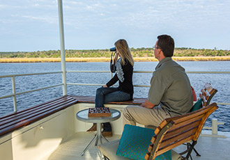 Chobe photo safari houseboat deck Photographic safari in Chobe Botswana